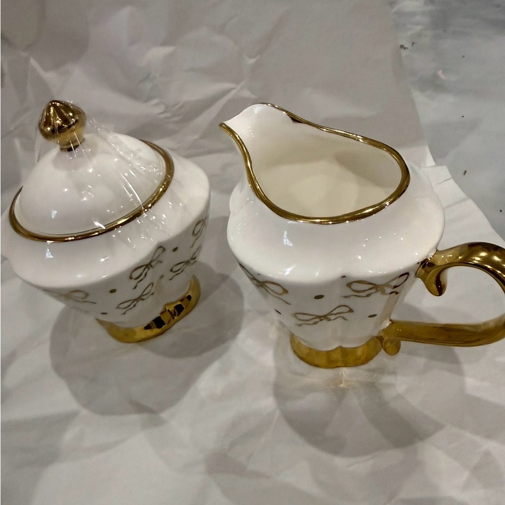 White Porcelain Creamer and Sugar Set with Gold Trim